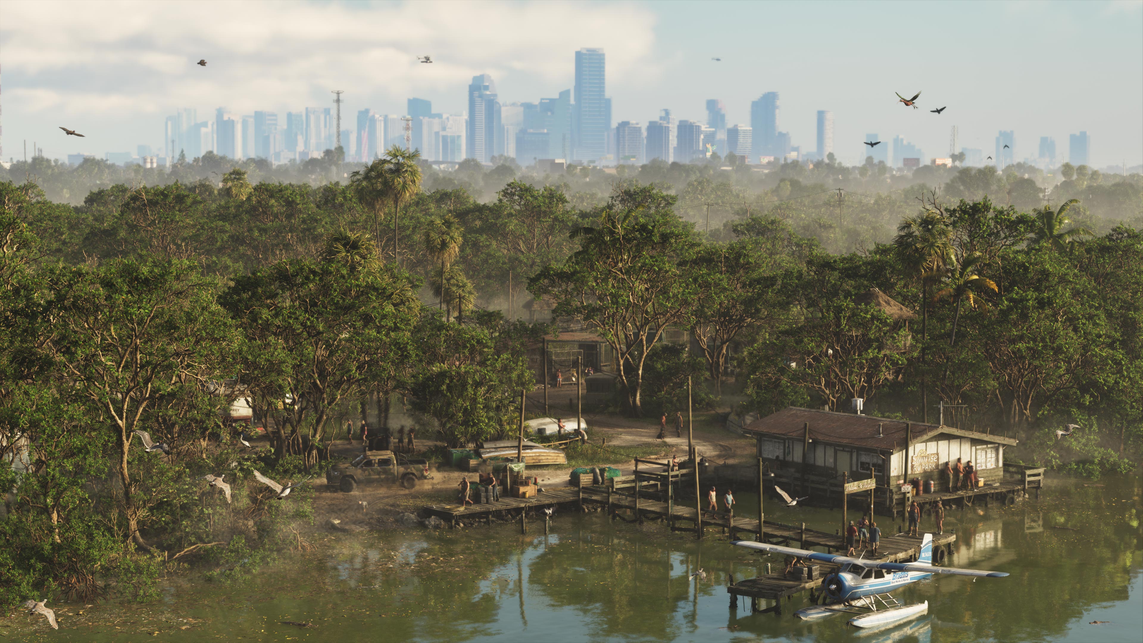 Hazy light, palms, water and a distant skyline in an official Grassrivers screenshot. The exact time of day is not confirmed.